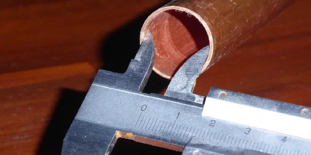 Vernier caliper measuring the inside diameter of a tube