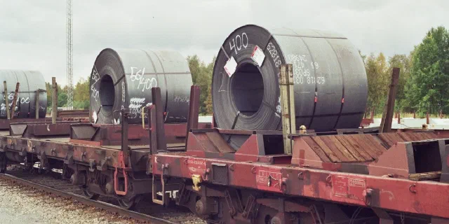 Steel coils loaded on railway freight wagons